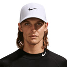 Nike Dri-FIT Advantage golf cap in White/Anthracite, worn, front