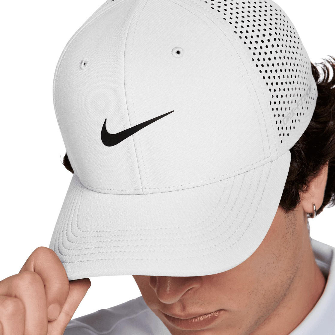 Nike Dri-FIT Advantage golf cap in White/Anthracite, close-up of the brim