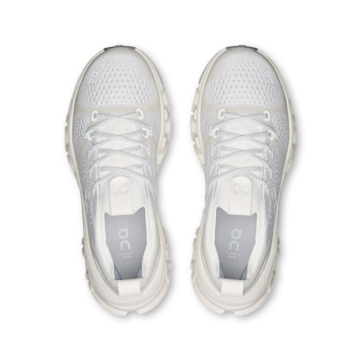 On Cloud X Tempo women's training shoe in Ivory/Ice, top view of the pair