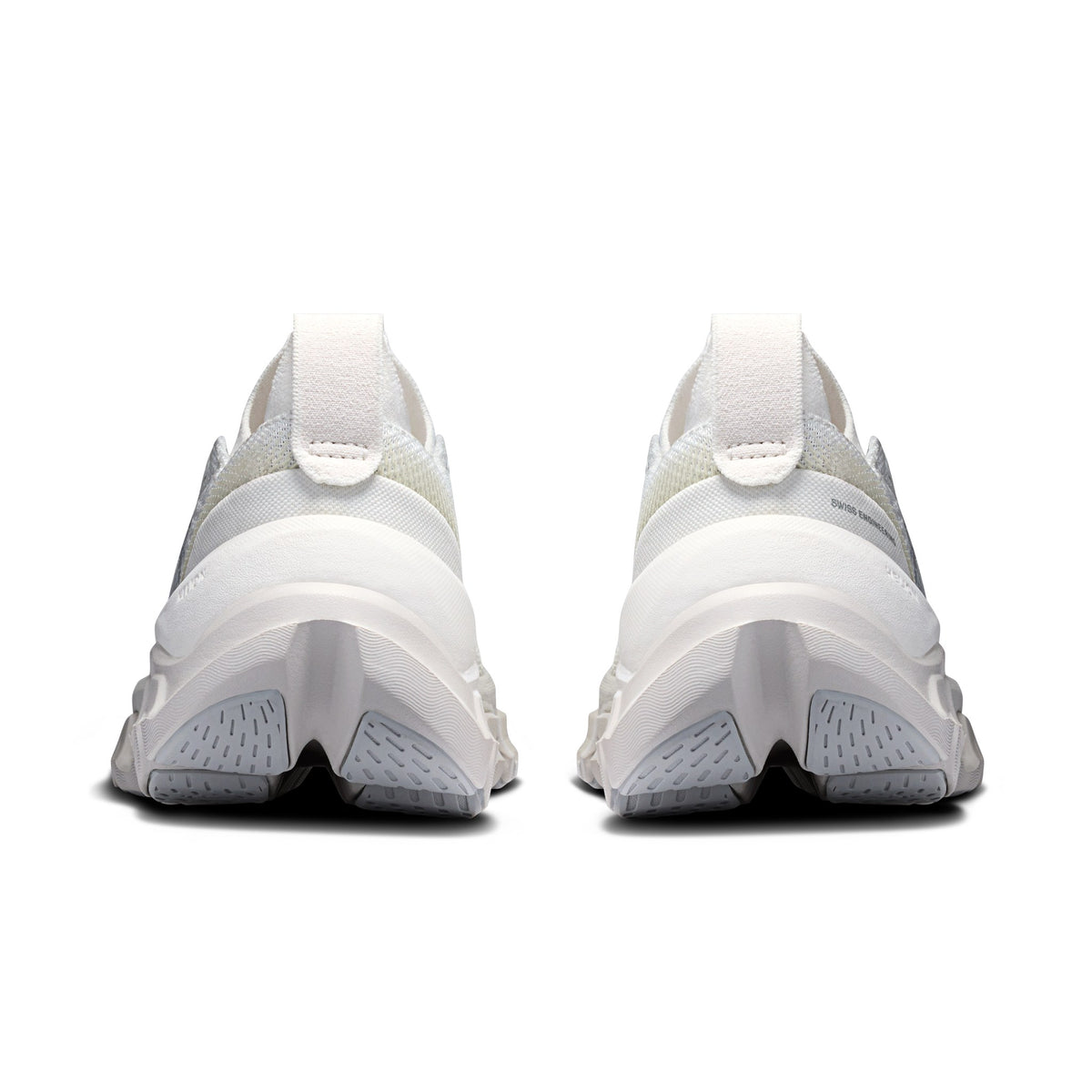 On Cloud X Tempo women's training shoe in Ivory/Ice, heel view of the pair