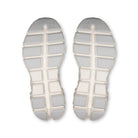 On Cloud X Tempo women's training shoe in Ivory/Ice, outsole of the pair